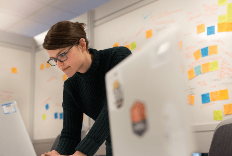 woman working on laptop in office